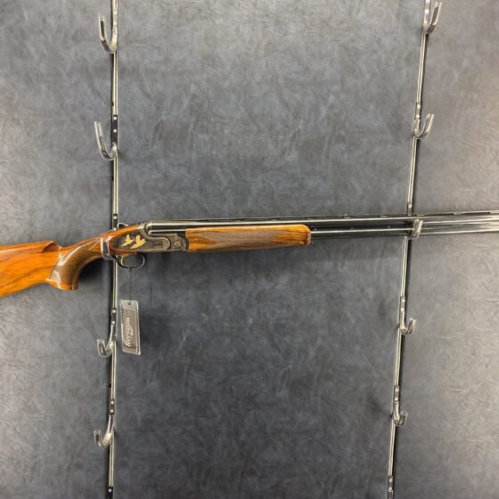 Caesar Guerini Magnus Sporting Limited 12 gauge over-and-under shotgun, full-length left side view