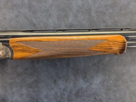 Checkered walnut forend and barrels of the Caesar Guerini Magnus Sporting Limited